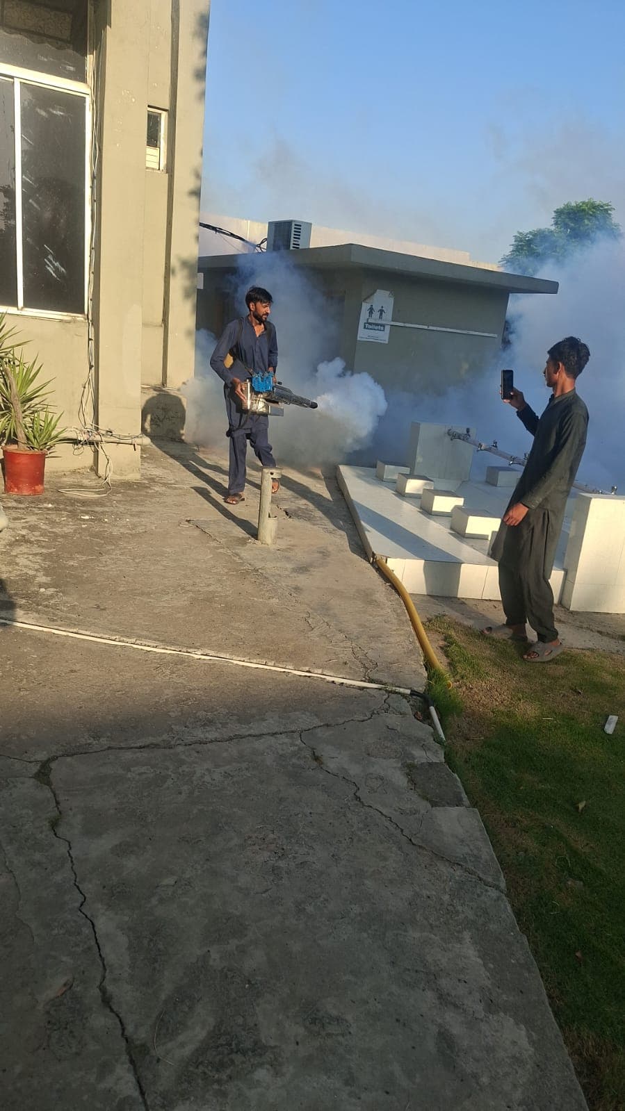Pest control technician providing termite treatment in Islamabad